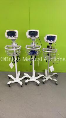 2 x Welch Allyn 53NT0 Vital Signs Monitors on Stands and 1 x Welch Allyn 53N00 Vital Signs Monitors on Stands (All Power Up)