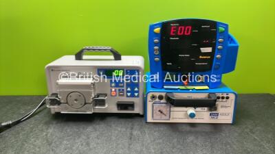 Mixed Lot Including 1 x St Jude Medical Cool Point Irrigation Pump (Powered Up) 1 x SAM 420LX Vacuum Pump (Untested Due to Missing Power Supply) 1 x GE Dinamap V100 Dinamap Patient Monitor (Powers Up with Error and Missing Front Cover) *SN 03449, 0127130