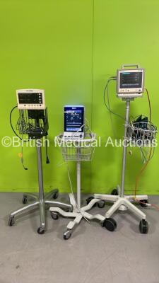 1 x Welch Allyn 52000 Series Vital Signs Monitor on Stand, 1 x Edan iM3 Patient Monitor on Stand (Broken Mounting Point) and Philips M3 M3046A Patient Monitor on Stand with M3001A Module with Press, Temp, NBP and ECG/Resp Options (All Power Up) *20006206