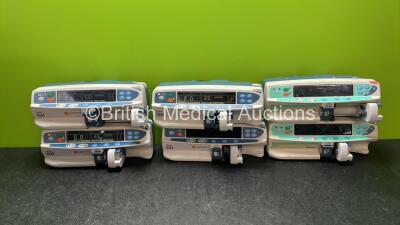 Job Lot Including 4 x Carefusion Alaris GH Syringe Pumps (All Power Up) 2 x Cardinal Health Alaris PK Syringe Pumps (1 Powers Up with Fault, 1 Powers Up Blank Screen)