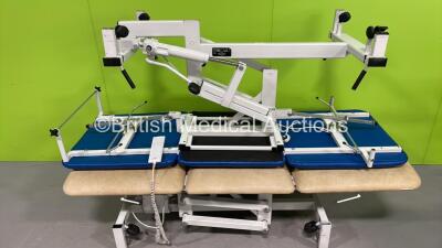 1 x Plinth 2000 Electric Patient Examination Couch with Controller (Powers Up) and 1 x Plinth 2000 Hydraulic Patient Examination Couch (Hydraulics Tested Working)