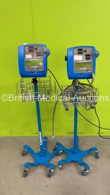 2 x GE Dinamap Pro 300V2 Vital Signs Monitors on Stands (1 x Powers Up, 1 x No Power - Both Missing Batteries and Battery Covers) *S/N AAX07080166SA / 032M0569009*