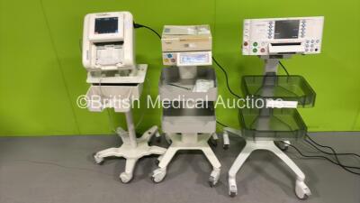 Job Lot Including 1 x Huntleigh Sonicaid FM800 Encore Fetal Monitor on Stand, 1 x Sonicaid Team Duo Fetal Monitor on Stand (Both Power Up) and 1 x Philips Avalon FM30 Fetal Monitor on Stand with 1 x Philips Avalon CL Wireless Transducer Docking Station (P