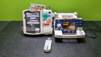 Job Lot Including 1 x Philips Heartstart MRx Defibrillator / Monitor Including Pacer, ECG and Printer Options with 1 x Paddle Lead, 1 x Philips M3725A Test Load, 1 x 3 Lead ECG Lead, 1 x Philips M3539A Modules, 1 x M3538A Battery and 1 x Agilent Heartstre