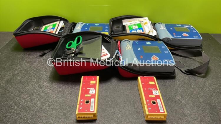 2 x Philips Heartstart FR2+ Defibrillators and 1 x Laerdal Heartstart FR2+ Defibrillator with 3 x Philips M3864A Batteries and 1 x Philips M3863A Battery (All Power Up and Pass Self Test) *SN 1205178623, 0208271057, 1206215915*