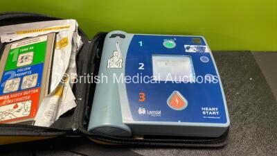 2 x Philips Heartstart FR2+ Defibrillators and 1 x Laerdal Heartstart FR2+ Defibrillator with 3 x Philips M3864A Batteries and 1 x Philips M3863A Battery (All Power Up and Pass Self Test) *SN 1205178623, 0208271057, 1206215915* - 5