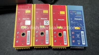 2 x Philips Heartstart FR2+ Defibrillators and 1 x Laerdal Heartstart FR2+ Defibrillator with 3 x Philips M3864A Batteries and 1 x Philips M3863A Battery (All Power Up and Pass Self Test) *SN 1205178623, 0208271057, 1206215915* - 6