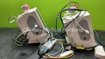 2 x Philips Heartstart MRx Defibrillators Including Pacer ,ECG and Printer Options with 2 x Paddle Leads, 2 x Philips M3725A Test Loads, 2 x 3 Lead ECG Leads, 2 x Philips M3538A Batteries and 2 x Philips M3539A Modules (Both Power Up) *SN US00535031, US00 - 5