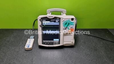 Philips MRx Defibrillator Including Pacer, ECG and Printer Options, 1 x M3725A Test Load and 1 x M3539A Module (Powers Up)