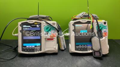 2 x Philips Heartstart MRx Defibrillators Including Pacer ,ECG and Printer Options with 2 x Paddle Leads, 2 x Philips M3725A Test Loads, 2 x 3 Lead ECG Leads, 1 x Laerdal QCPR Meter, 2 x Philips M3538A Batteries, and 2 x Philips M3539A Modules (Both Power