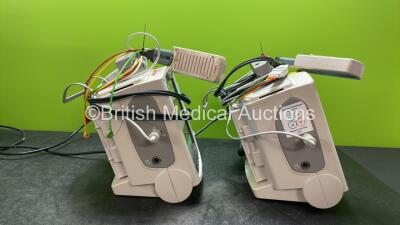 2 x Philips Heartstart MRx Defibrillators Including Pacer ,ECG and Printer Options with 2 x Paddle Leads, 2 x Philips M3725A Test Loads, 2 x 3 Lead ECG Leads, 2 x Philips M3538A Batteries, and 2 x Philips M3539A Modules (Both Power Up) *SN US00599187, US0 - 4