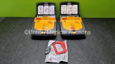 2 x Medtronic Lifepak CR Plus Defibrillators and 1 x Electrode Pack *Out of Date* in Carry Cases (Both Power Up) *SN 44642449 / 34354861*