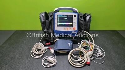 Zoll X Series Monitor/Defibrillator Including ECG, SPO2, NIBP, CO2 and Printer Options with 1 x Sure Power II Battery, 1 x NIBP Cuff and Hose, 1 x 4 Lead ECG Lead, 1 x 6 Lead ECG Lead, 1 x Paddle Lead and 1 x SPO2 Finger Sensor in Carry Bag (Powers Up and