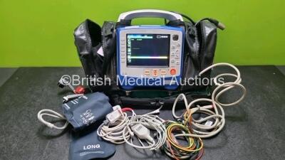 Zoll X Series Monitor/Defibrillator Including ECG, SPO2, NIBP, CO2 and Printer Options with 1 x Sure Power II Battery, 1 x NIBP Cuff and Hose, 1 x 4 Lead ECG Lead, 1 x 6 Lead ECG Lead, 1 x Paddle Lead and 1 x SPO2 Finger Sensor in Carry Bag (Powers Up and