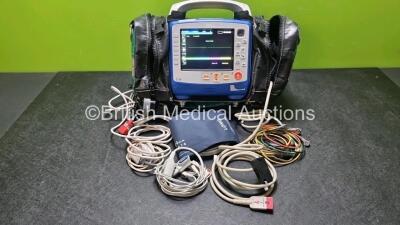 Zoll X Series Monitor/Defibrillator Including ECG, SPO2, NIBP, CO2 and Printer Options with 1 x Sure Power II Battery, 1 x NIBP Cuff and Hose, 1 x 4 Lead ECG Lead, 1 x 6 Lead ECG Lead, 1 x Paddle Lead and 1 x SPO2 Finger Sensor in Carry Bag (Powers Up and