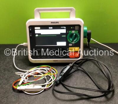 Philips Efficia DFM100 Defibrillator Including Pacer, ECG and Printer Options Software Revision 2.00 with 1 x Philips 989803190371 Battery Pack, 1 x Paddle Lead and 1 x 3 Lead ECG *Mfd 2019* (Powers Up)