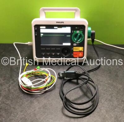 Philips Efficia DFM100 Defibrillator Including ECG and Printer Options Software Revision 2.00 with 1 x Philips 989803190371 Battery Pack, 1 x Paddle Lead and 1 x 3 Lead ECG *Mfd 2019* (Powers Up)