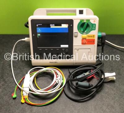 Philips Heartstart XL+ Defibrillator Including Pacer, ECG and Printer Options with 1 x Philips M1674A 3 Lead ECG Lead, 1 x Philips Battery Ref 989803167281 and 1 x Paddle Lead (Powers Up)