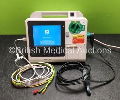 Philips Heartstart XL+ Defibrillator Including Pacer, ECG and Printer Options with 1 x Philips M1674A 3 Lead ECG Lead, 1 x Philips Battery Ref 989803167281 and 1 x Paddle Lead (Powers Up)