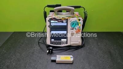 Philips Heartstart MRx Defibrillator Including Pacer, ECG, SpO2, NIBP, C02 and Printer Options with 1 x Hard Paddle with Dock, 1 x Paddle Lead, 1 x Philips M3725A Test Load, 1 x 3 Lead ECG Lead, 1 x Philips M3538A Battery and 1 x Philips M3539A Module (B