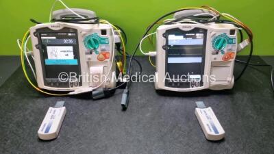 2 x Philips Heartstart MRx Defibrillators Including, Pacer, ECG and Printer Options with 2 x Paddle Leads, 2 x Philips M3725A Test Loads, 2 x 3 Lead ECG Leads, 2 x Philips M3538A Batteries and 2 x Philips M3539A Modules (Both Power Up) *SN US00315367 / US