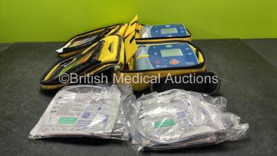 2 x Laerdal Heartstart FR2+ Defibrillators with 2 x Philips M3863A Batteries *Install Date 07-2024, 08-2020* 4 x Skintact Electrodes in Carry Bags (Both Power Up) *SN 0706199272, 0307227378*