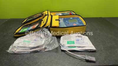 2 x Philips Heartstart FR2+ Defibrillators with 2 x Philips M3863A Batteries *Install Dates 09/2025, 10/2022* 4 x Skintact Electrodes in Carry Bags (Both Power Up Pass Self Tests) *SN 1010990554, 1110990738*