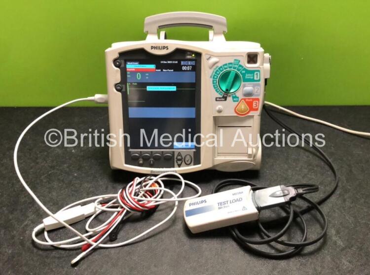 Philips Heartstart MRx Defibrillator Including ECG and Printer Options with 1 x 3 Lead ECG Lead, 1 x Paddle Lead and 1 x Philips M3725A Test Load (Powers Up with Stock Battery, Batteries Not Included, Service Required) *SN US00315092*