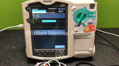 Philips Heartstart MRx Defibrillator Including ECG and Printer Options with 1 x 3 Lead ECG Lead, 1 x Paddle Lead and 1 x Philips M3725A Test Load (Powers Up with Stock Battery, Batteries Not Included, Service Required) *SN US00315092* - 2