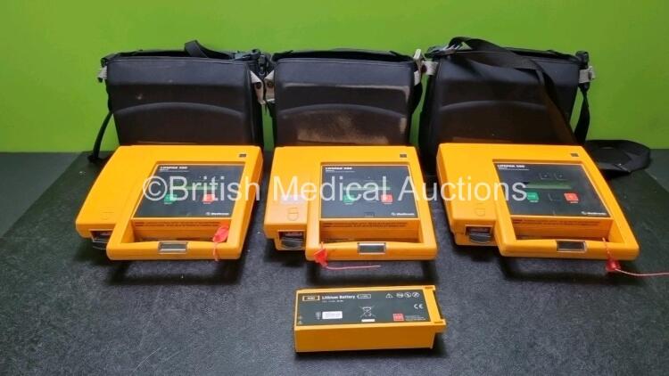 3 x Medtronic Lifepak 500 Biphasic Automated External Defibrillators in Carry Case with 1 x Battery (No Power Suspected Flat Battery)