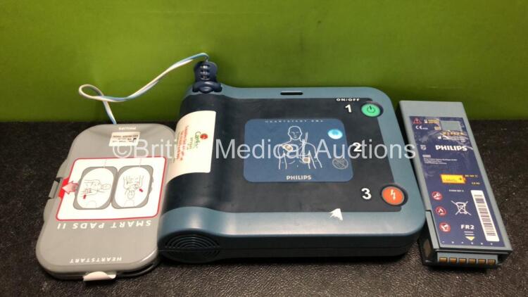 Job Lot Including 1 x Philips Heartstart FRx Defibrillator (Powers Up) with 1 x Battery and 1 x Smart Pads II Pack *Expired* and 1 x Philips M3863A Battery (Untested)