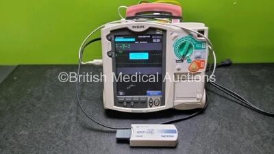 Philips Heartstart MRx Defibrillator / Monitor Including, ECG, SpO2, NIBP, CO2 and Printer Options, with 1 x M3725A Test Load,1 x Paddle Lead, 1 x Philips M3539A Module and 1 x Philips M1674A 3 Lead ECG Lead (Powers Up) *SN US0035103*