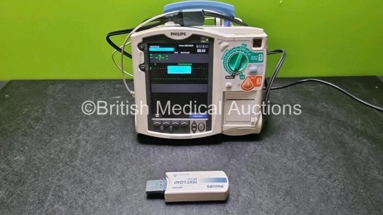 Philips Heartstart MRx Defibrillator / Monitor Including, ECG, SpO2, NIBP, CO2 and Printer Options, with 1 x M3725A Test Load,1 x Paddle Lead, 1 x Philips M3539A Module and 1 x Philips M1674A 3 Lead ECG Lead (Powers Up) *SN US0035103*