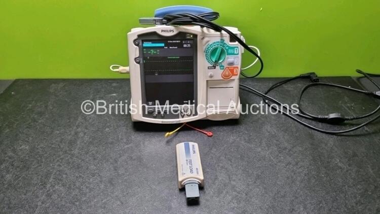 Philips Heartstart MRx Defibrillator / Monitor Including, ECG, SpO2, NIBP, CO2 and Printer Options, with 1 x M3725A Test Load,1 x Paddle Lead, 1 x Philips M3539A Module, 1 x M3538A Battery and 1 x Philips M1674A 3 Lead ECG Lead (Powers Up, Small Chip in S