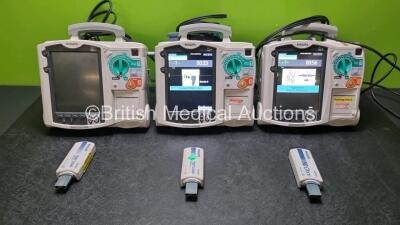 2 x Philips Heartstart MRx Defibrillators / Monitors Including ECG and Printer Options with 3 x Paddle Leads, 3 x Philips M3725A Test Loads and 3 x Philips M3539A Modules (All Power Up) *SN US00568916 / US00568914 / US009576157*