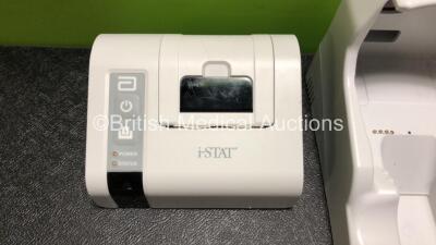 Job Lot Including 1 x Abbott i-Stat Printer (Missing Battery Casing - See Photos) and 1 x Abbott i-Stat 1 Downloader / Recharger (Untested Due to No Power Supply) *SN 1400352 / DRC-71864* - 2