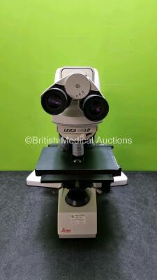 Leica DMLB Type 020-519.11 Benchtop Microscope with 2 x HC Plan s 10 x / 22 Eyepieces, 6 x Optics Including 1 x N Plan 2.5 x / 0.07, 1 x N Plan 5 x / 0.12, 1 x HC PL Fluotar 10 x / 0.30, 1 x HC PL Fluotar 20 x / 0.30, 1 x PL Fluotar 40 x / 0.70, 1 x N Pla