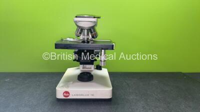 Leitz Laborlux 12 Benchtop Microscope with 3 x Optics **1 x Leitz 160/- EF 10/0.25 Optic, 1 x Leitz 160/0.17 EF 40/0.65 Optic and 1 x Leitz 160/0.17 NPL FLUOTAR 100/1.32OEL Optic** (No Power with Missing Top Attachment and Eyepieces)