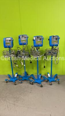 2 x GE Dinamap Pro 300V2 Vital Signs Monitors on Stands, 1 x GE Dinamap Pro 400 Vital Signs Monitor on Stand and 1 x GE Dinamap Pro 300 Vital Signs Monitor on Stand ( All Power Up) *S/N 504729 / 210594 / 01064 / 201595*