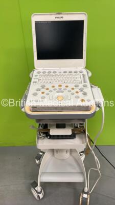 Philips CX50 Flat Screen Portable Ultrasound Scanner Ref. 453561414281 *Mfd - 03/2010* with 1 x Philips L12-3 Transducer / Probe and Power Supply on CX Cart (HDD - REMOVED - Powers Up with Damage to Wheels) *SG31000391*