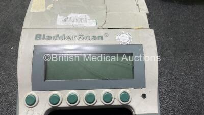 Mixed Lot Including 2 x deSoutter Cast Cutters, 1 x Verathon BVI 3000 Bladder Scanner with 1 x Battery (No Power with Damage-See Photo) 1 x Masimo Set Pulse CO Oximeter (Untested Due to Possible Flat Battery) 1 x Philips Respironics Porta Neb Nebulizer (P - 5