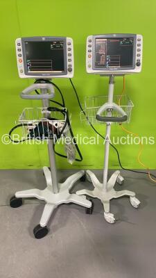 2 x GE Dash 2500 Patient Monitors on Stands with SPO2, ECG and NIBP Options on Stands (Both Power Up with Marks to 1 x Screen)