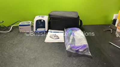 Job Lot Including 1 x Fisher & Paykel SH870AEK Surgical Humidifier and 1 x Fisher & Paykel PT100UK Airvo 2 Humidifier Unit with User Manual and Breathing Tube in Carry Bag (Both Power Up)