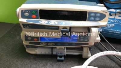 Mixed Lot Including 1 x Sager Emergency Traction Splint, 2 x Carefusion Alaris CC Infusion Pumps (Both Power Up with Blank Display-See Photos) 1 x LidCO Monitor (Powers Up) 3 x Datex Ohmeda S/5 Monitors (All Spares and Repairs) 8 x Hoses - 2