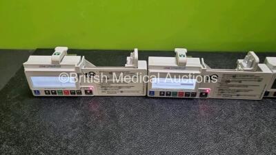 6 x CME Medical T34 Ambulatory Syringe Pumps (All Power Up when Tested with Stock Batteries-Batteries Not Included 1 x Powers Up with Faulty Screen and 2 x with Missing Battery Cover - See Photo) - 5