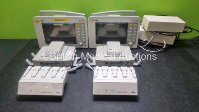 2 x Drager Infinity Delta Patient Monitors Including HemoMed 1, Aux/Hemo 3, MultiMed and NIBP Options (Both Power Up) with 2 x Drager HemoMed Pods (Both with Damage to Casing) 2 x Drager Infinity Docking Stations,(Both with Damage to Casing ) and 2 x Powe