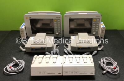 2 x Drager Infinity Delta Patient Monitors Including HemoMed 1, Aux/Hemo 3, MultiMed and NIBP Options (Both Power Up with Damage to Casing - See Photos) with 2 x Drager HemoMed Pods (Both with Damage to Casing) 2 x Drager Infinity Docking Stations, 2 x Dr