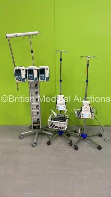 Alaris Asena Charging Station with 3 x Carefusion Alaris GP Guardrails Plus Syringe Pumps and 2 x ResMed Humi Care D900 Humidifiers on Stands (All Power Up) *S/N 135022691 / 1358043484 / 135043498*