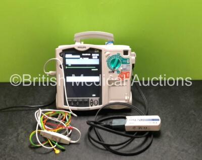 Philips Heartstart MRx Defibrillator Including ECG and Printer Options with 1 x 3 Lead ECG Lead, 1 x Paddle Lead, 1 x Philips M3725A Test Load, 1 x Philips M3538A Battery and 1 x Philips M3539A Battery Module (Powers Up)