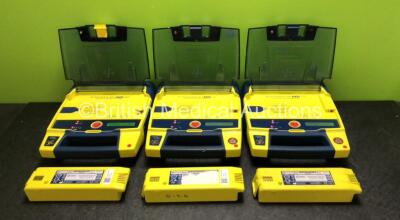 3 x Cardiac Science Powerheart AED G3 Defibrillators with 6 x Batteries (All Power Up - 3 x in Photo, 3 x in Defibrillators)